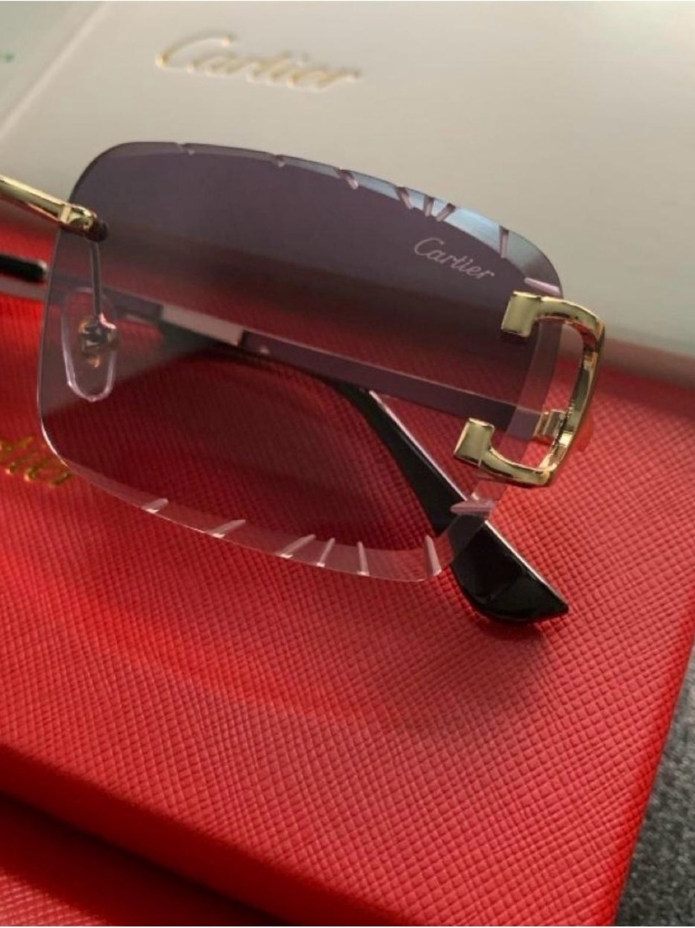 Cartier Women's Rimless Sunglasses with Purple Gradient Lenses and Gold Accents